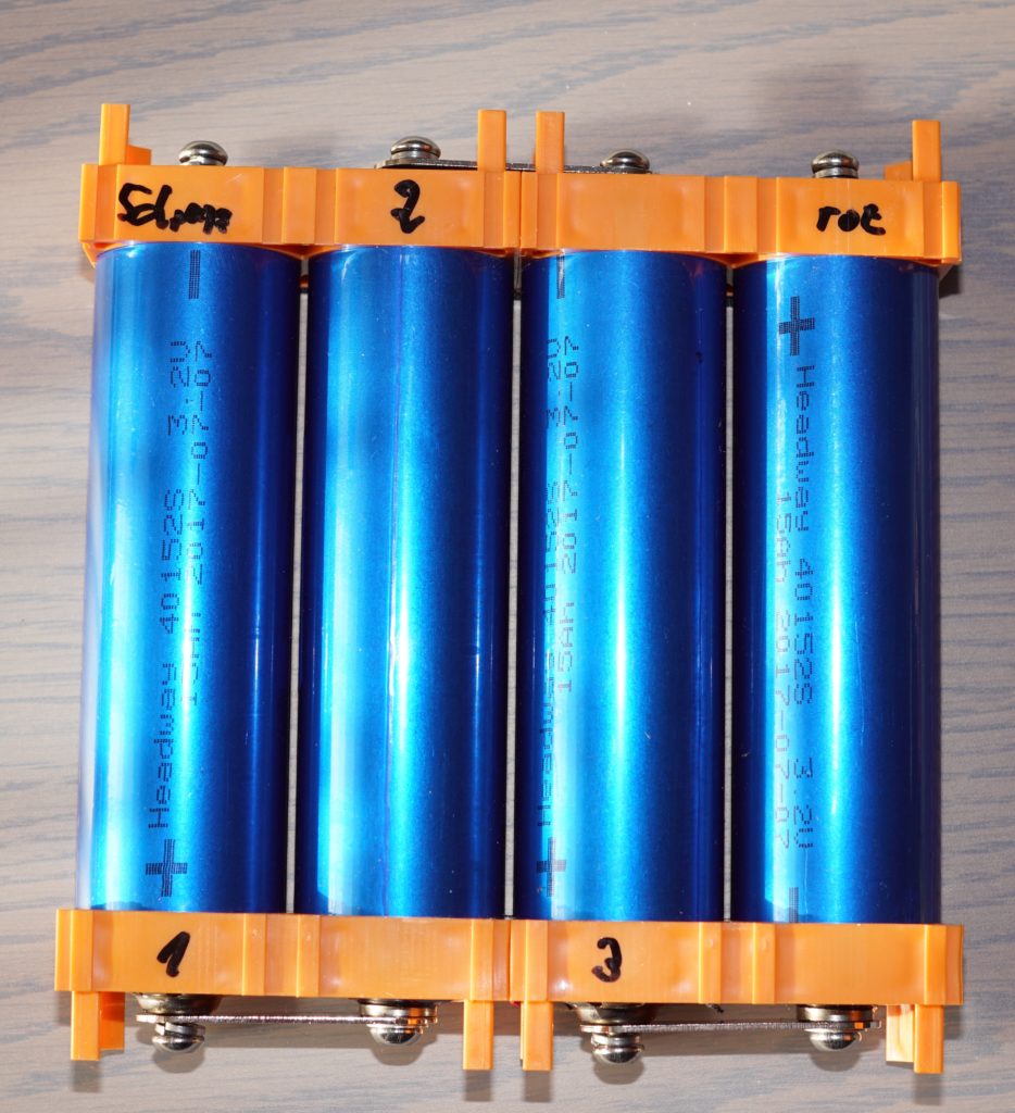 LiFePO4 battery cells in holders